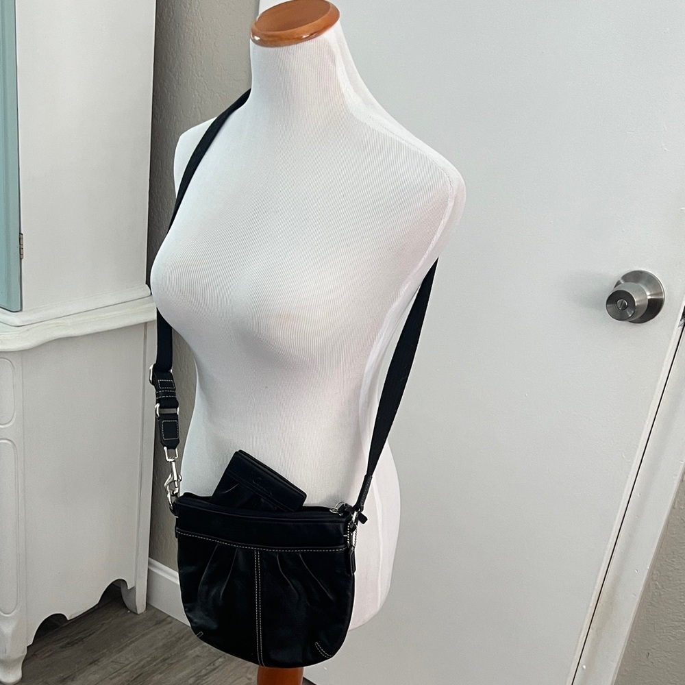 Elegant Coach Black Crossbody Bag with matching wallet. Like new use one time.